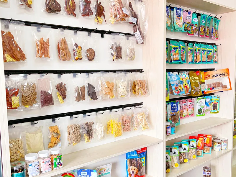 Stand-up pouch, flat pouch and tub packaging formats side by side